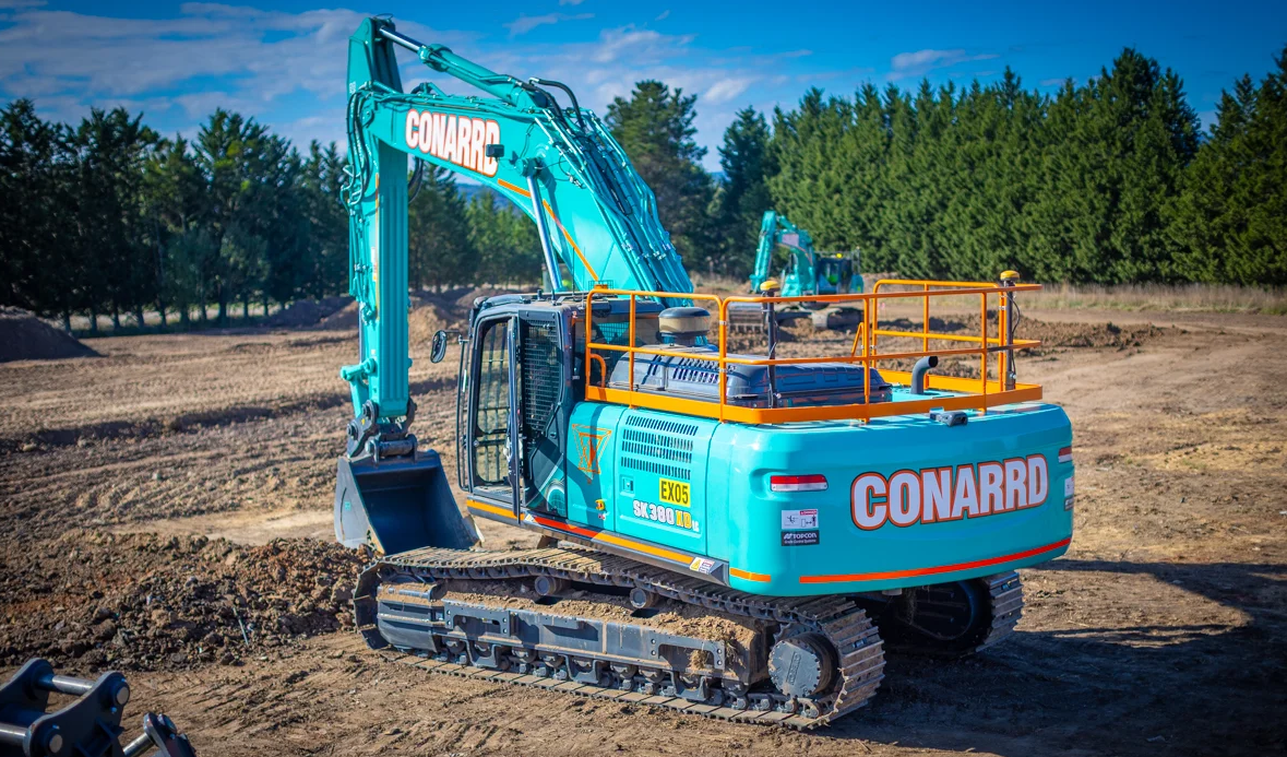 Building Better Together — CONARRD and Melbourne Tractors Forge Ahead with the Kobelco SK380XDLC